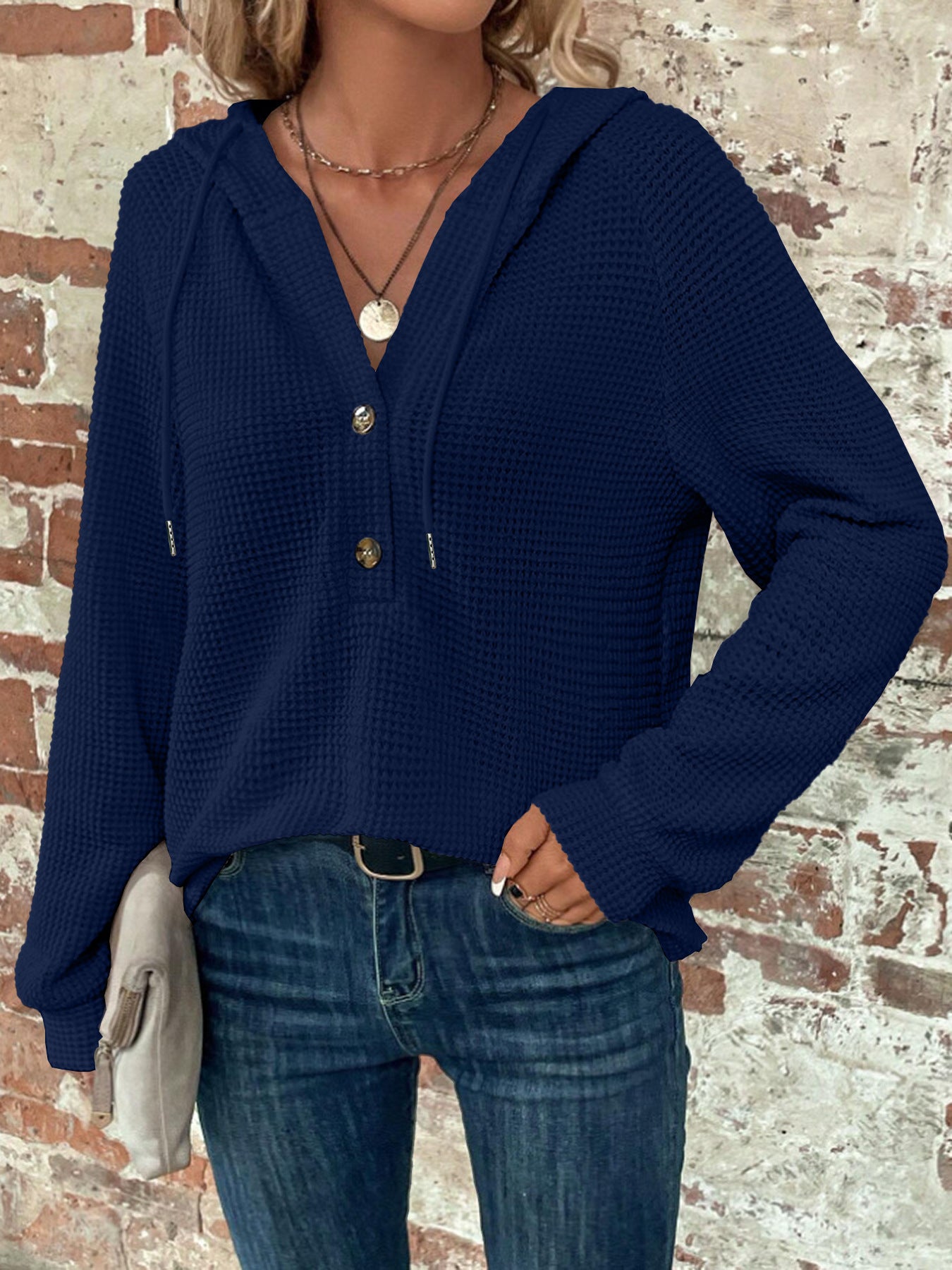 Mila™ capuchon met textuur en knopen